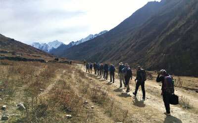 Trekkers walking in the valley of Langtang